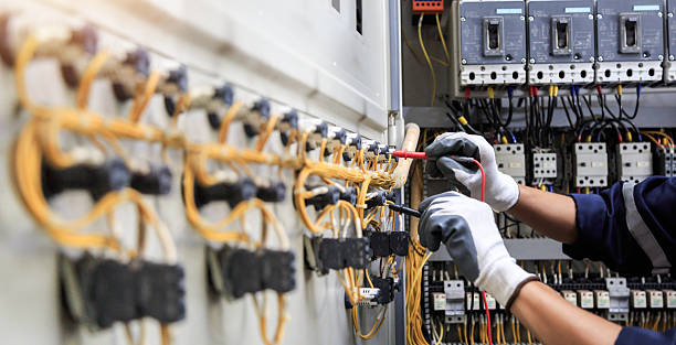 Professional Electrician technician working in Greenacres, FL